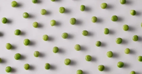 Green Peas Pattern On White Background, Minimalist Vegetable Arrangement Stock Footage 284133648