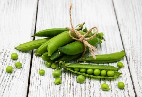 Green peas on a table Stock Photos