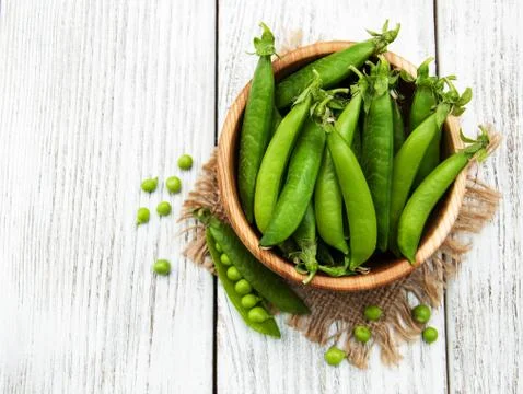 Green peas on a table Stock Photos