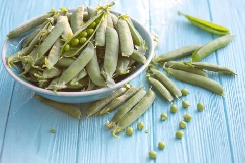Green peas on a table Stock Photos