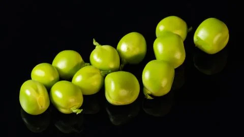 Green peas on the table Stock Photos