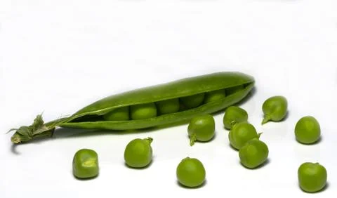 Green peas on the table Stock Photos