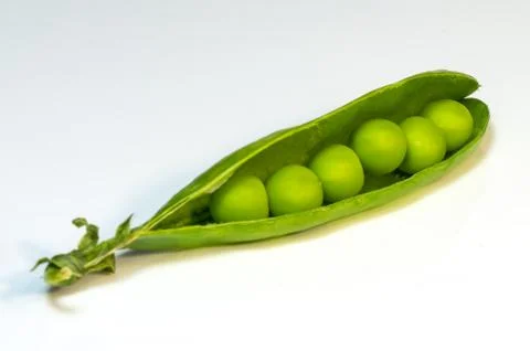 Green peas on the table Stock Photos