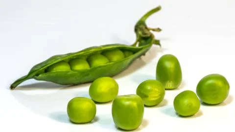 Green peas on the table Stock Photos