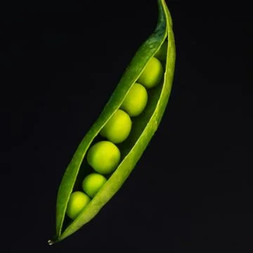 Green peas on the table Stock Photos