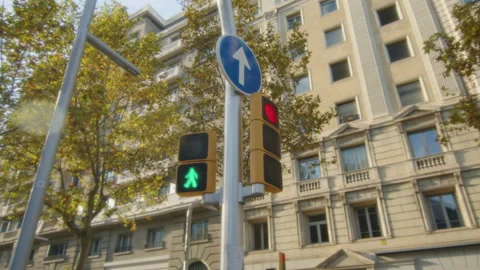 Green pedestrian light turns red at city intersection Stock Footage 221096140