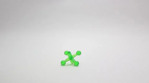 Green peg top spinning _5 Stock Footage 8920626