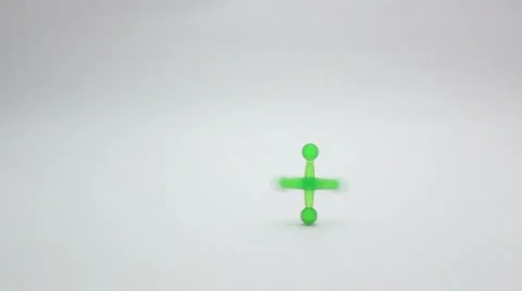 Green peg top spinning _6 Stock Footage 8920667