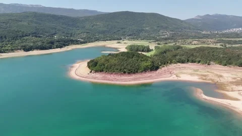 Green peninsula on the lake Video stock 285932625