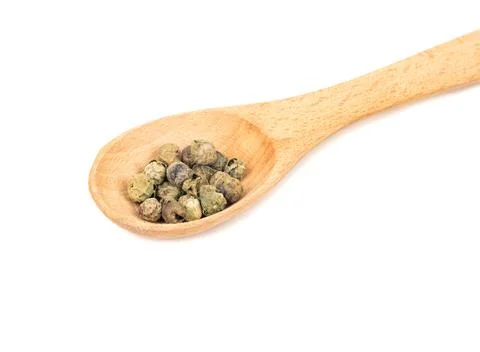 Green pepper peas in spoon Stock Photos