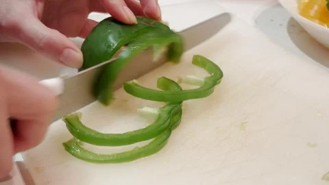 Green Pepper Slicing Skillfully Demonstrates Home Cooking Preparation Video stock 328867767