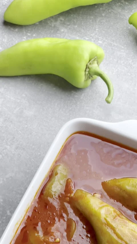 Green pepper stuffed with minced meat and rice in tomato sauce. Stock Footage 248470199