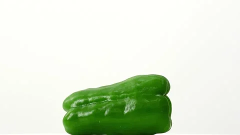The green pepper on the white background Stock Footage 91799349