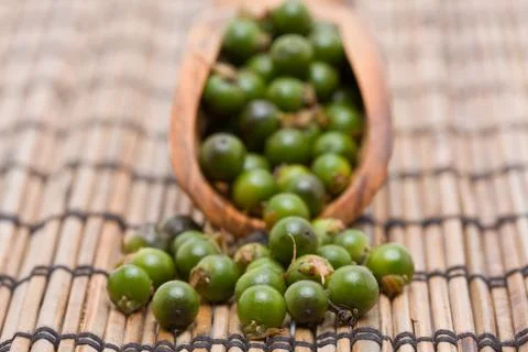 Green peppercorns Stock Photos