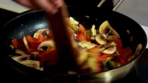 Green peppers and corn are mixed with fresh fruits Video stock 333873250