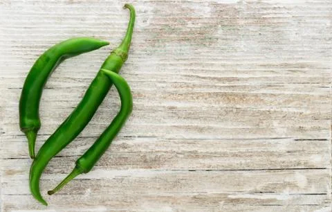 Green peppers background Stock Photos