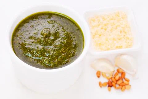 Green pesto with pine nuts garlic parmesan cheese Stock Photos