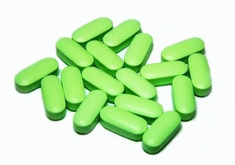 Green pills Stock Photos