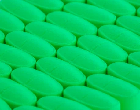 Green pills Stock Photos
