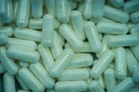 Green pills Stock Photos