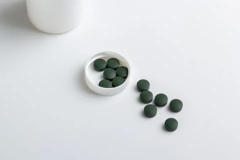 Green pills Stock Photos