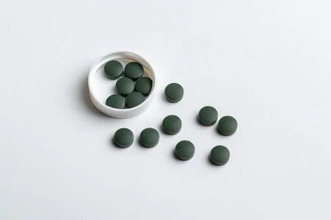 Green pills Stock Photos