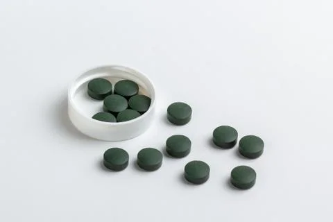 Green pills Stock Photos
