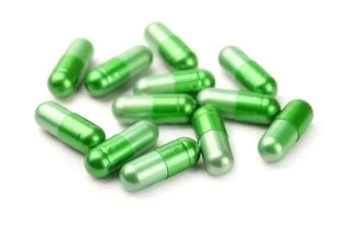 Green pills Stock Photos