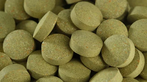 Green pillsclose up rotation Stock Footage 204738879