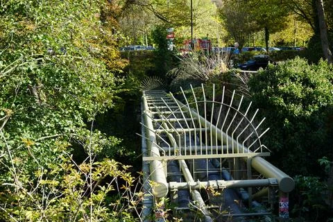 Green Pipe Bridge Through Trees, With Ice Cream Van And Cars, Matlock Bath, Stock Photos