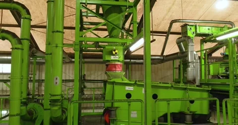 Green Pipes And Cyclone Below Hall Roof, Recycling Plant, Low Angle Видео 340659647