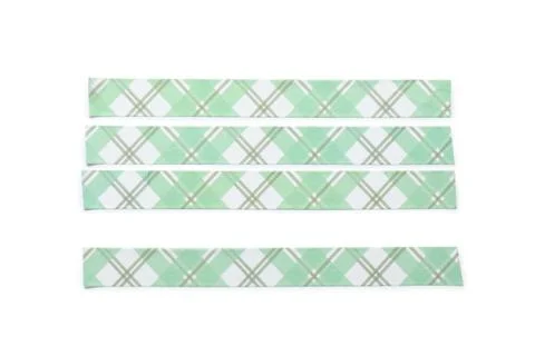 Green plaid patterned washi tape strips for crafting and decorative projects, Stock Photos
