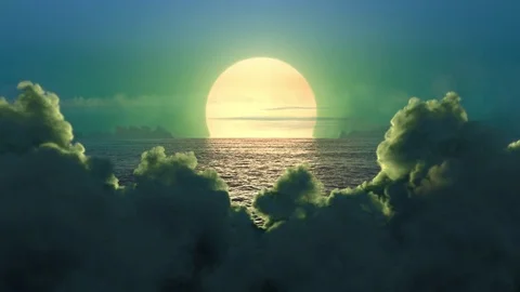 Green planet. Clouds (alpha matted) covering the setting sun, the clouds buildin Stock Footage 84490604