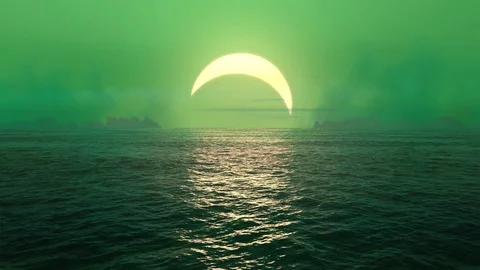 Green planet - sunset and solar eclipse over seamlessly looped ocean.  Stock Footage 81523751