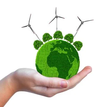 Green planet with trees and wind turbines in hand Foto stock