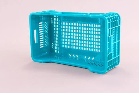 Green plastic basket Stock Photos