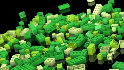 Green plastic blocks tumbling into a pile Stockbeeldmateriaal 83930060