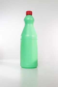 A green plastic bottle on a white background Stock Photos