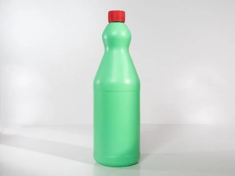 A green plastic bottle on a white background Stock Photos