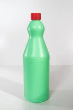 A green plastic bottle on a white background Stock Photos