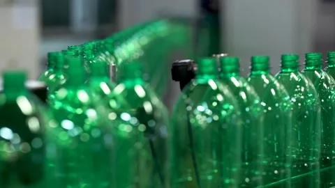 The Green Plastic Bottles On The Conveyor Pouring Of Drinking Water Stock Footage 87090936