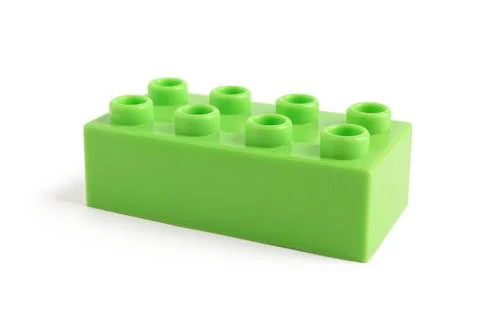 Green plastic building block on white background Stock Photos