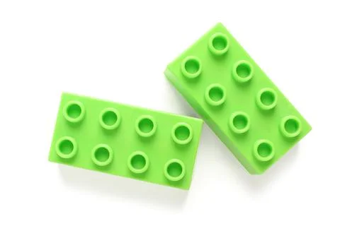 Green plastic building blocks on white background Stock Photos