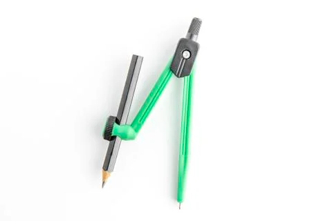 Green plastic compass with pencil 库存照片