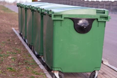 Green plastic garbage containers Fotos de archivo