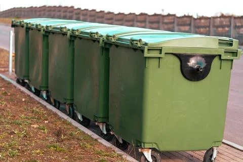 Green plastic garbage containers 库存照片