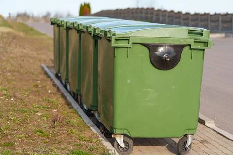 Green plastic garbage containers Stock-Fotos