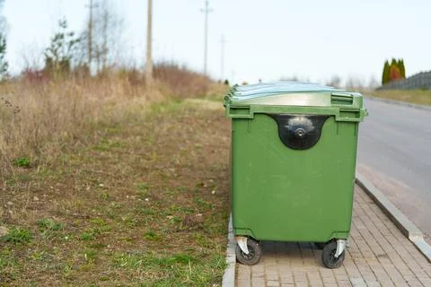 Green plastic garbage containers Fotos de archivo