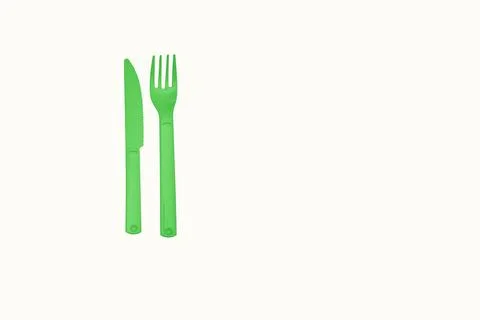Green plastic knife fork for camping, isolated on white Stock Illustration