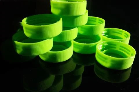 Green plastic lids Stock Photos
